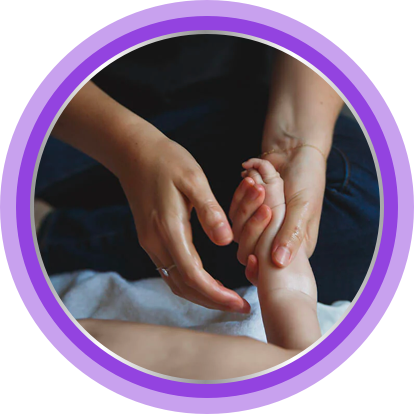 Mum massaging baby