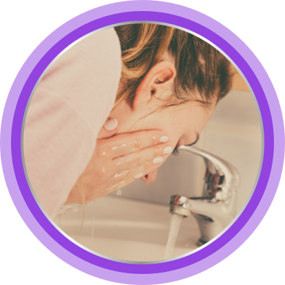 Woman washing her face